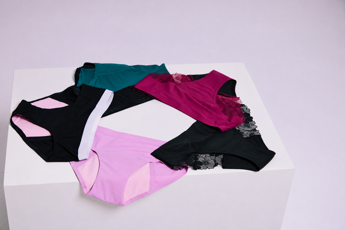 B.Peachy period underwear arranged on a white plinth