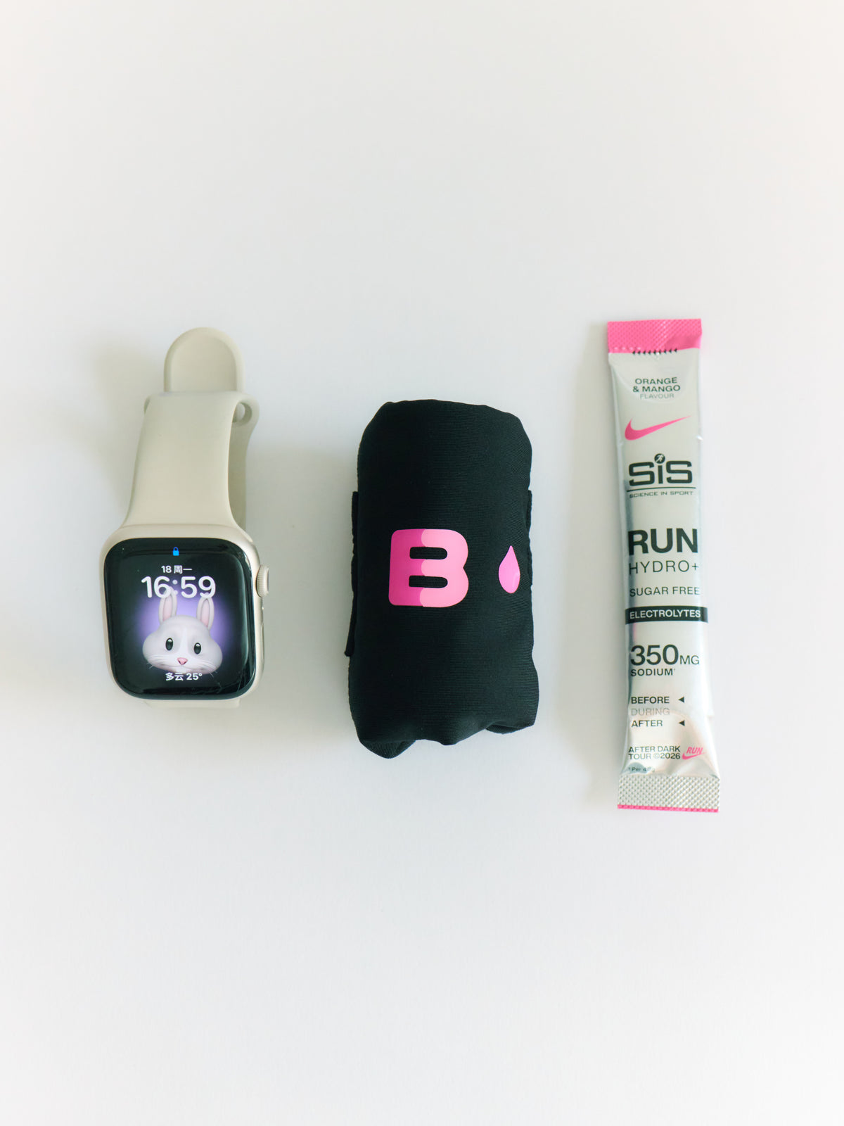 Rolled B.Peachy reusable pad alongside running essentials