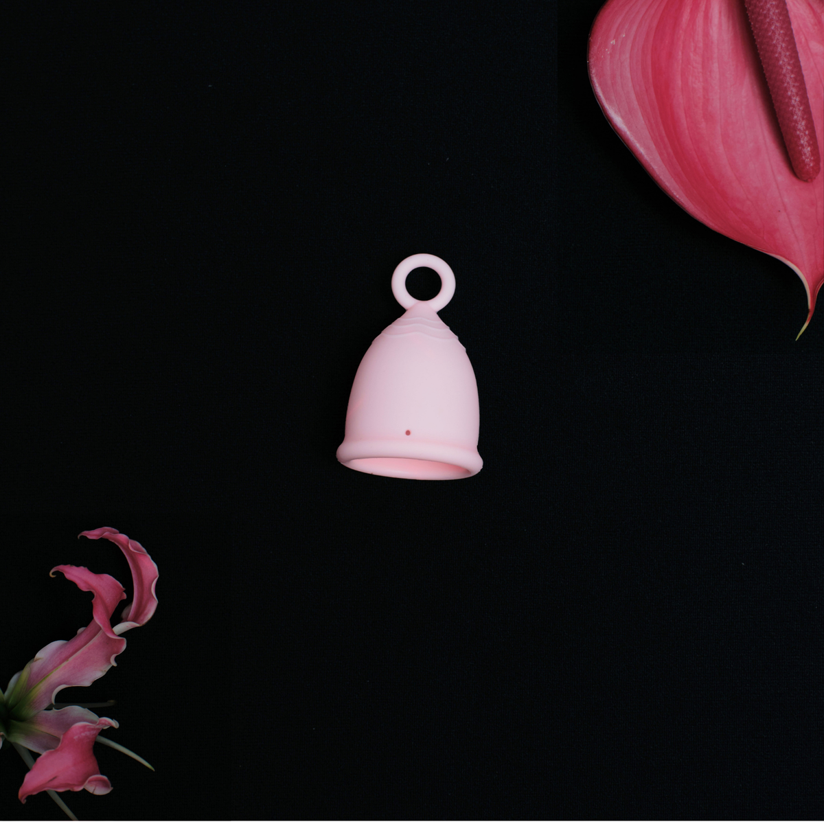 Peachy menstrual cup in pale pink