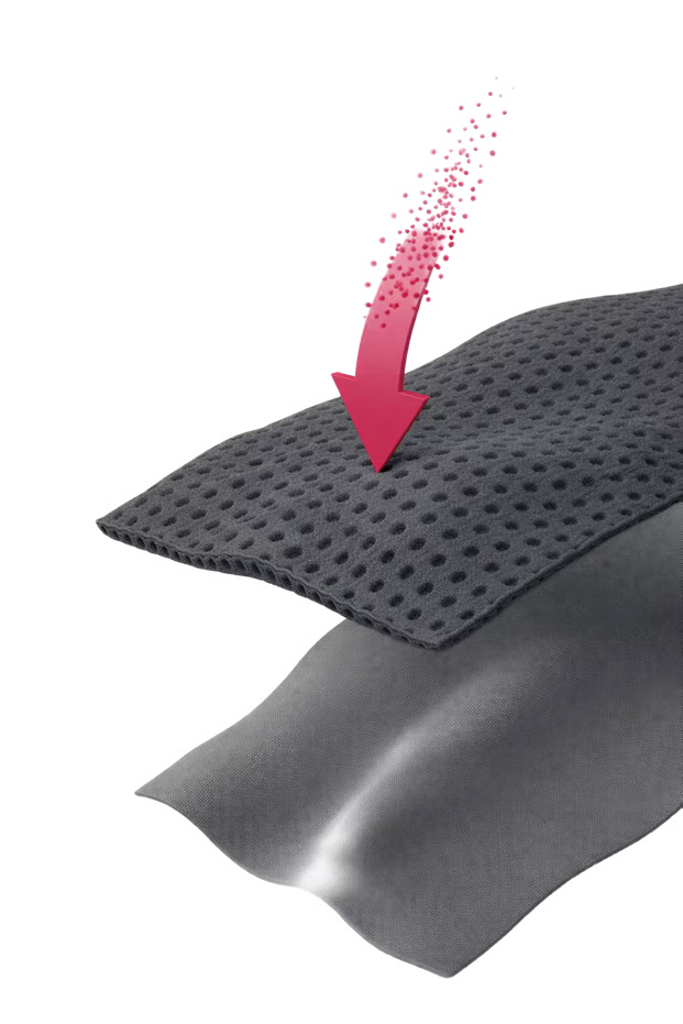 Honeycomb absorbent fabric above a protective barrier